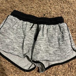 Black and grey lounge shorts.